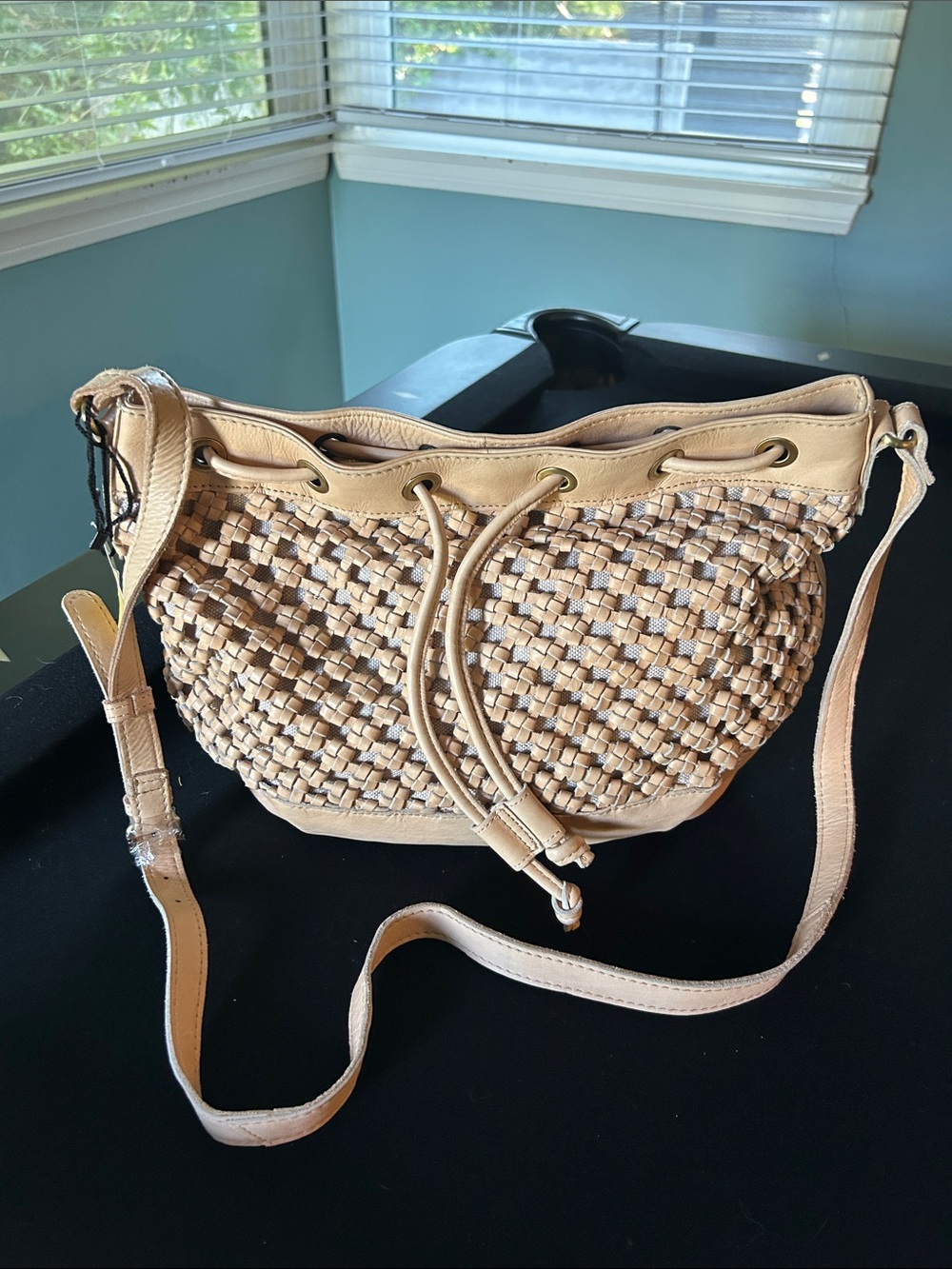 Woven Drawstring Crossbody Bag in Beige